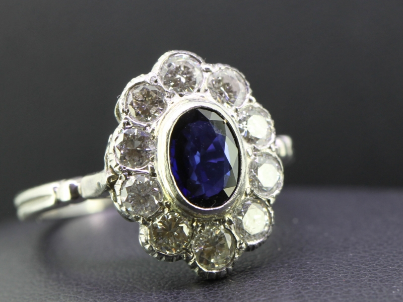 Beautiful sapphire and diamond platinum cluster ring