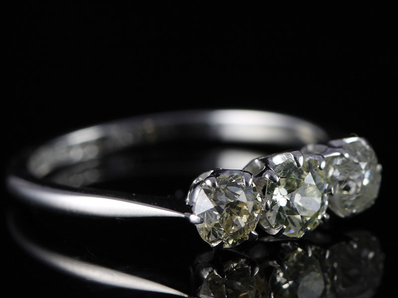 Adorable three stone diamond 18 carat gold and platinum ring