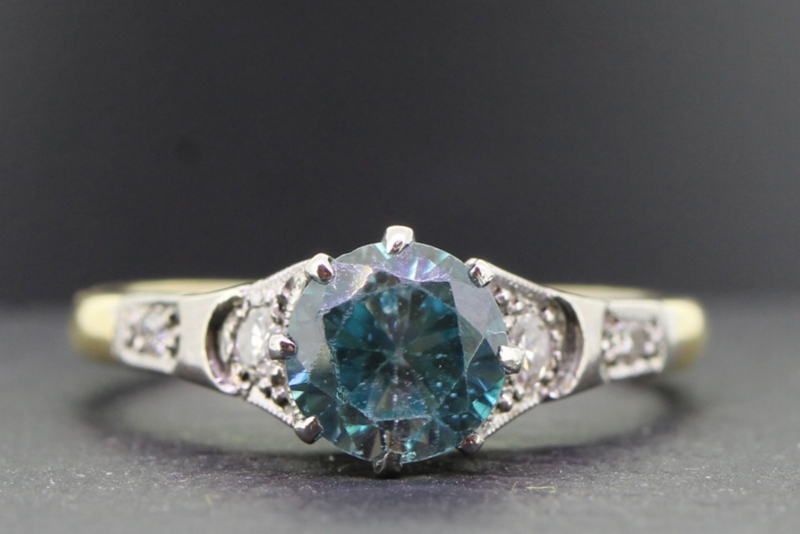 Stunning blue zircon and diamond 18 carat gold ring
