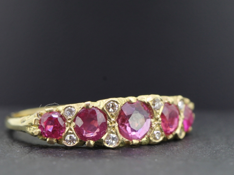 Beautiful ruby and diamond 18 carat gold carved half hoop