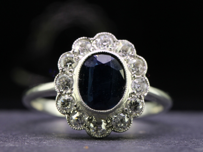 Stunning vintage sapphire and diamond platinum cluster ring