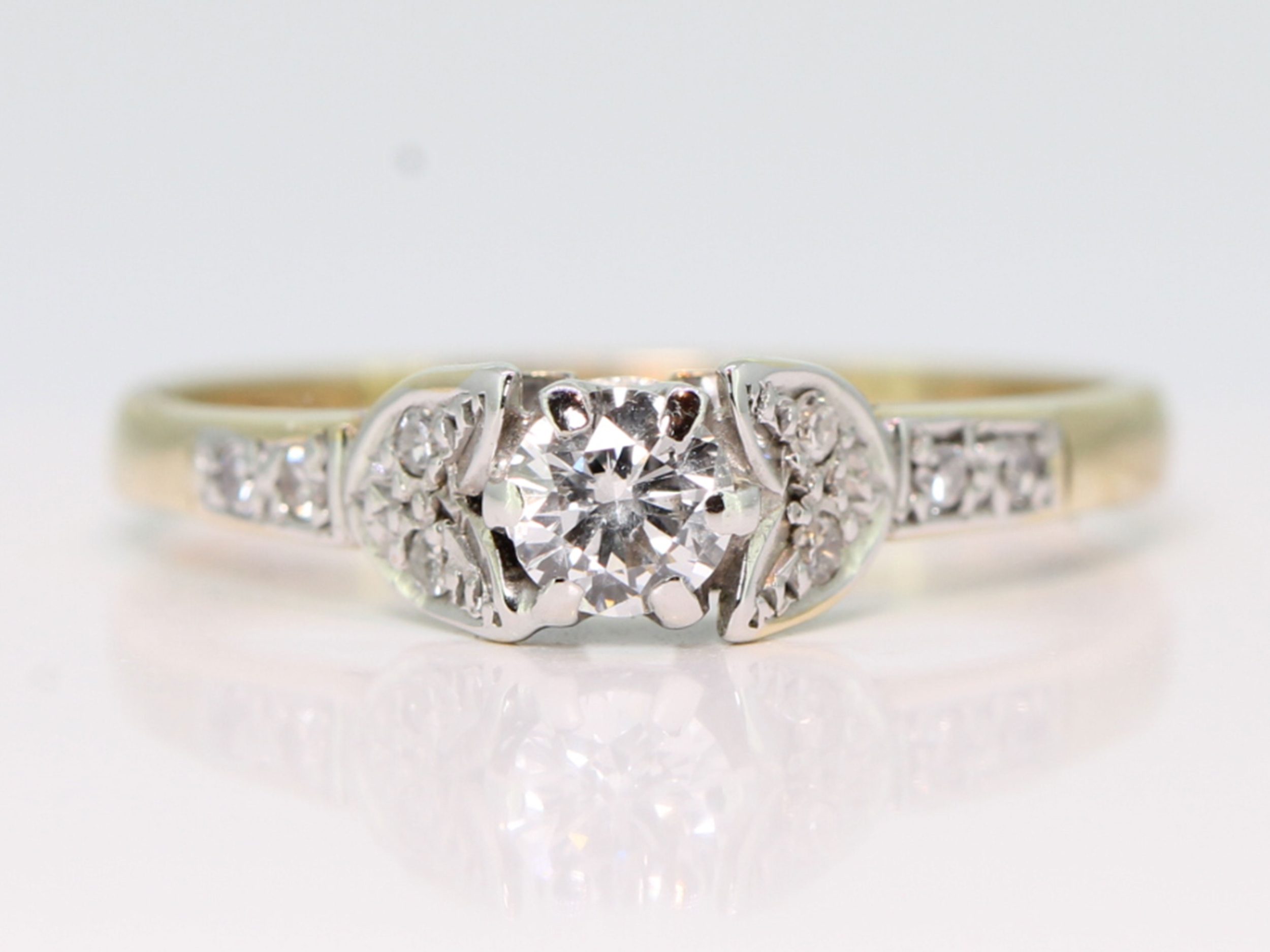 Graceful 9 carat gold diamond solitaire ring