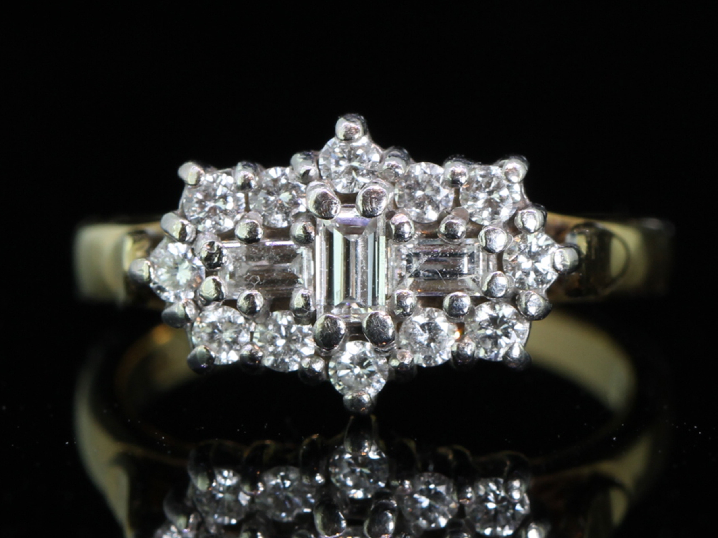 Beautiful baguette and brilliant cut diamond cluster 18 carat gold ring