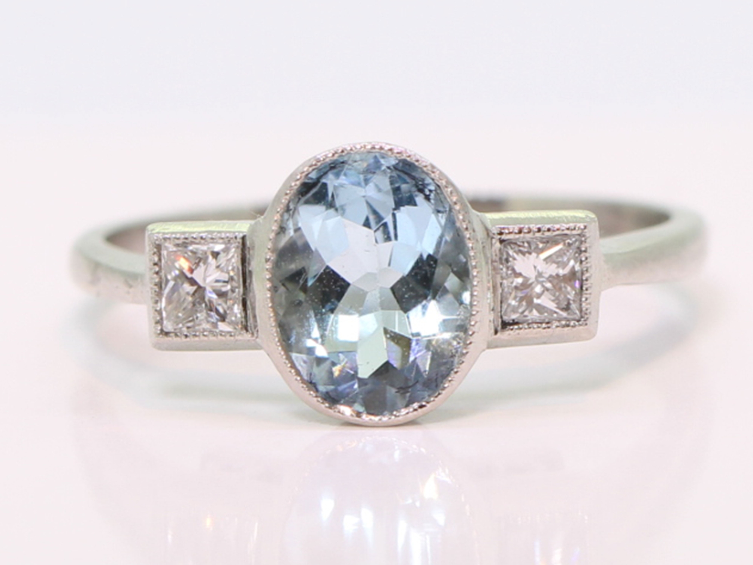 Art deco inspired aquamarine and diamond platinum ring