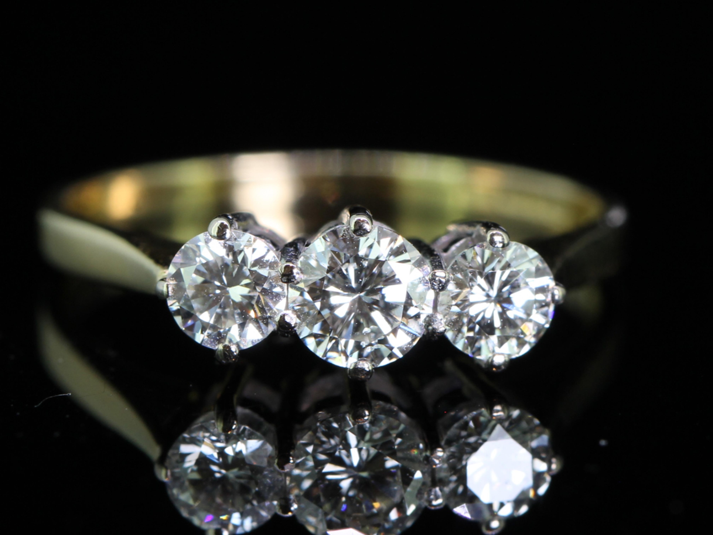 Classic diamond 18 carat gold trilogy ring