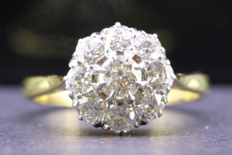  stunning vintage diamond daisy platinum and 18 carat gold ring