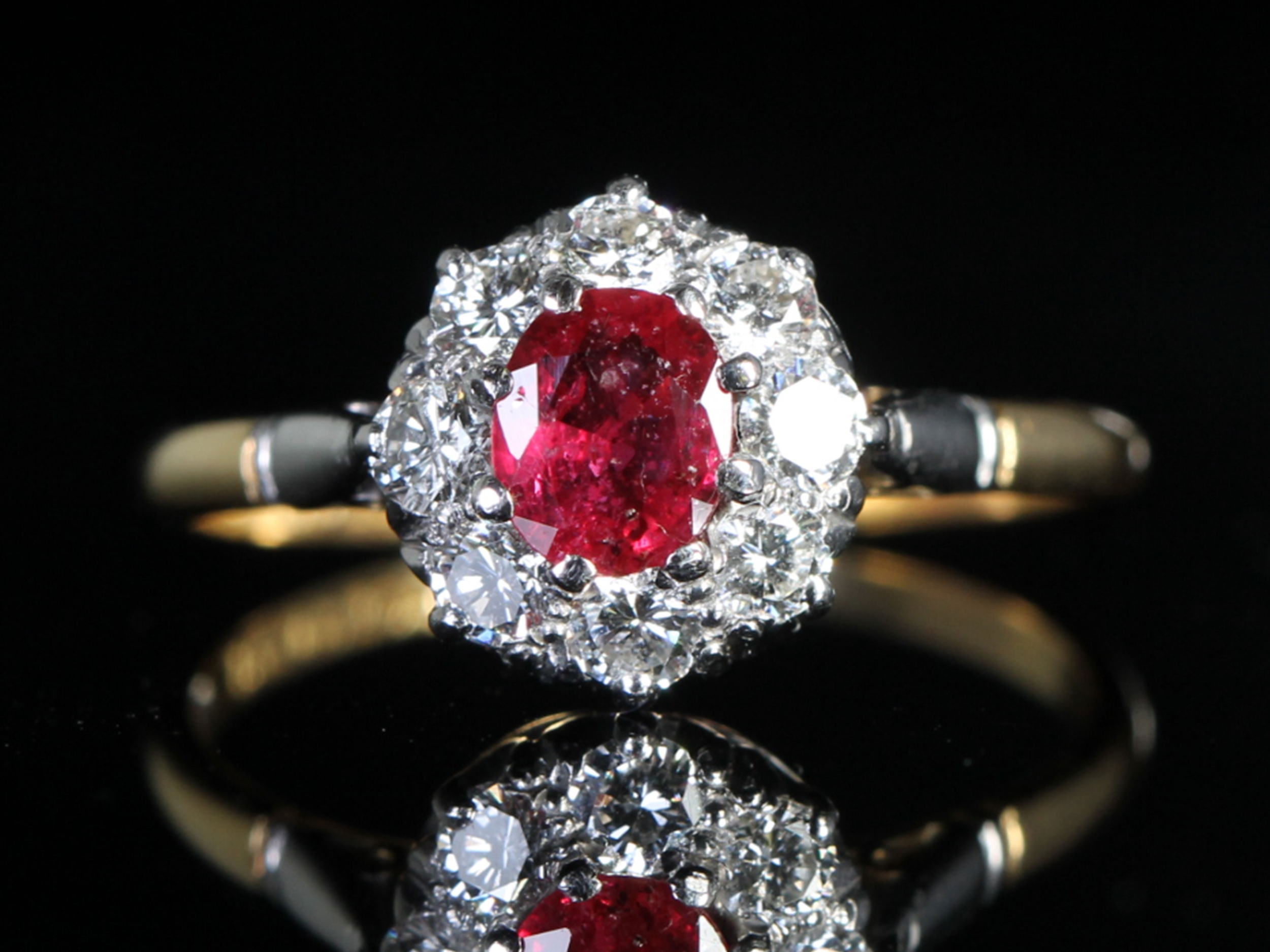 Art deco ruby and diamond platinum and 18ct gold cluster ring