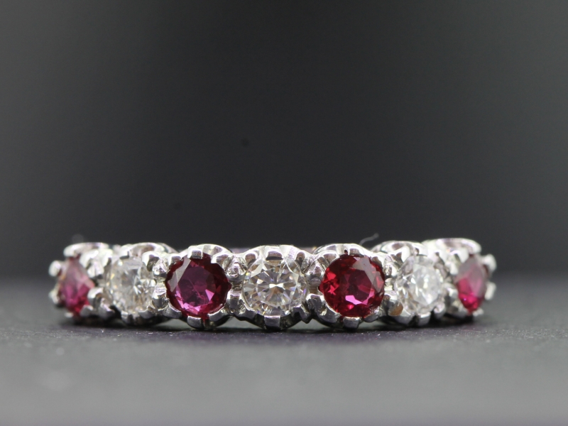 Elegant ruby and diamond seven stone 18 carat gold eternity ring