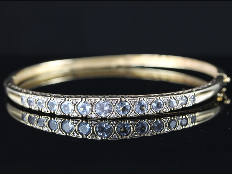 Lovely aquamarine and diamond bangle handcrafted in 9 carat gold