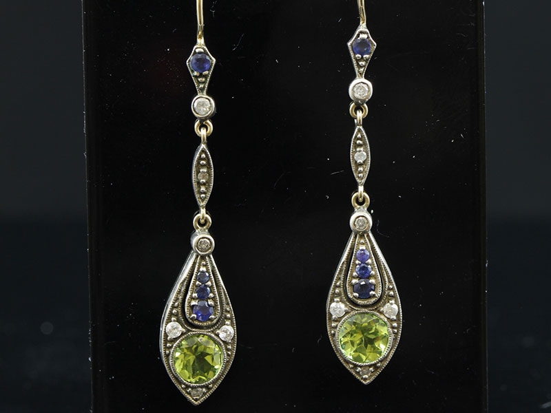 Wonderful pair of art deco inspired gold/silver earrings