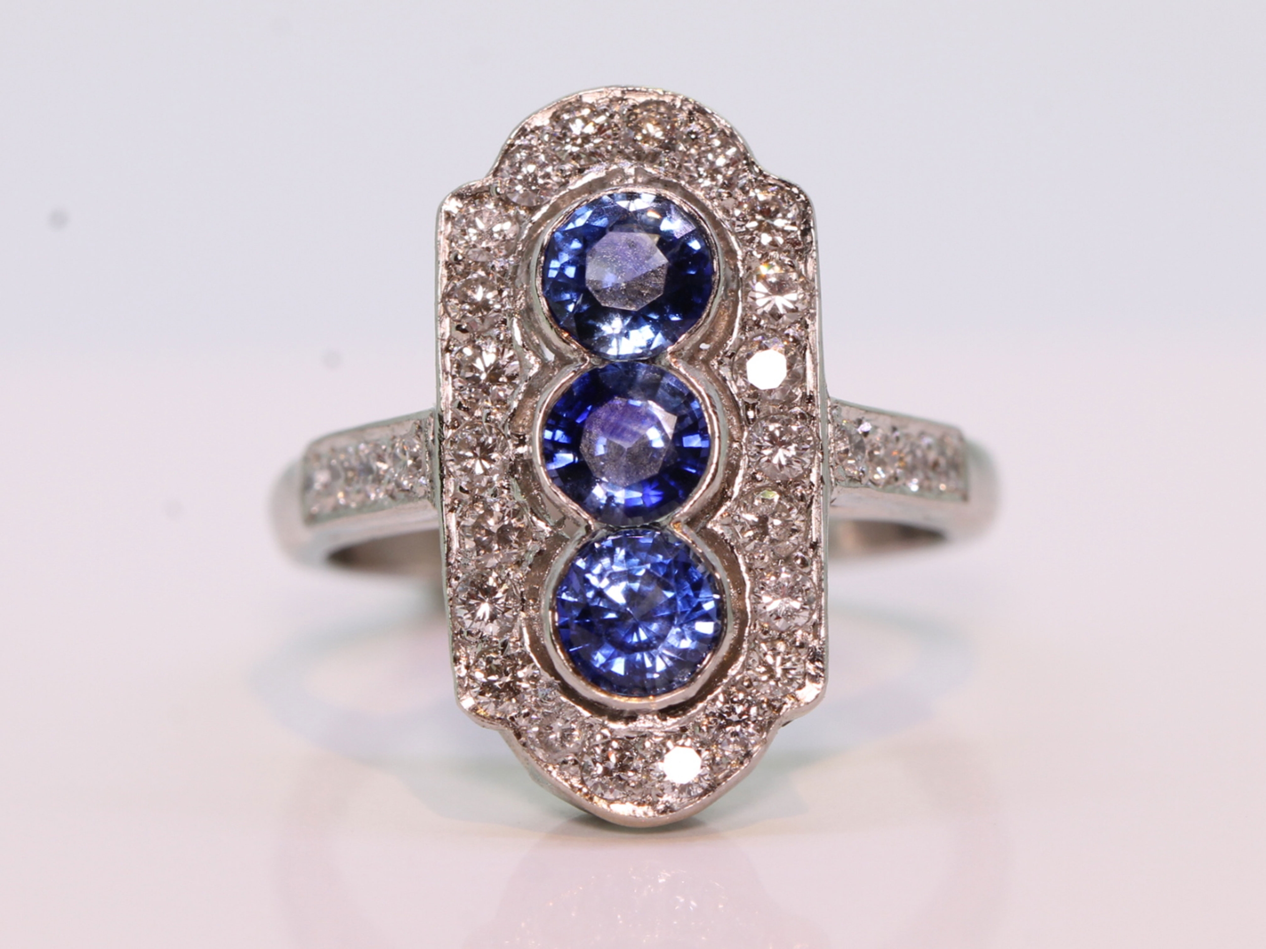 Art deco style sapphire and diamond platinum panel ring