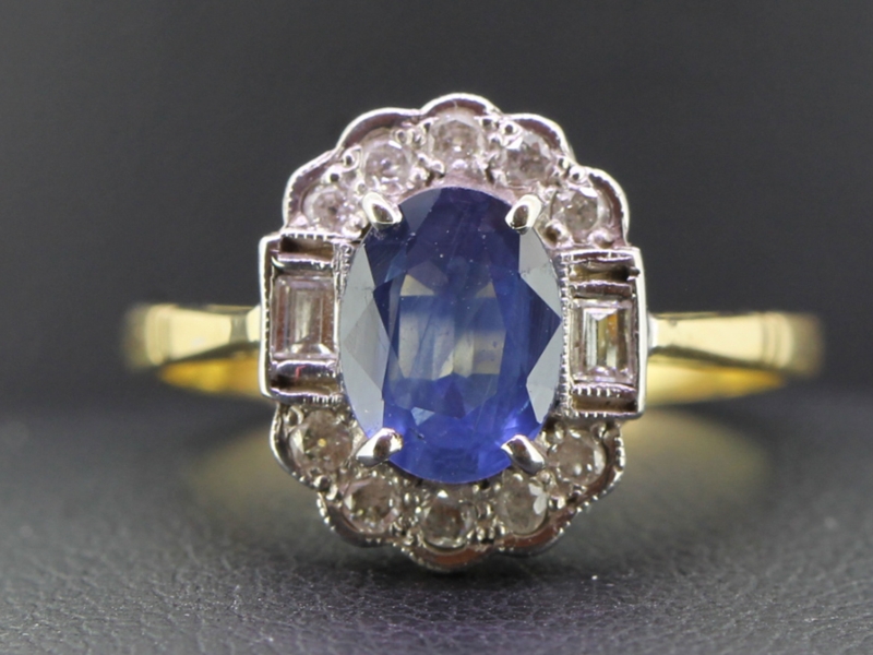 Gorgeous  ceylon sapphire and diamond cluster 18 carat gold ring