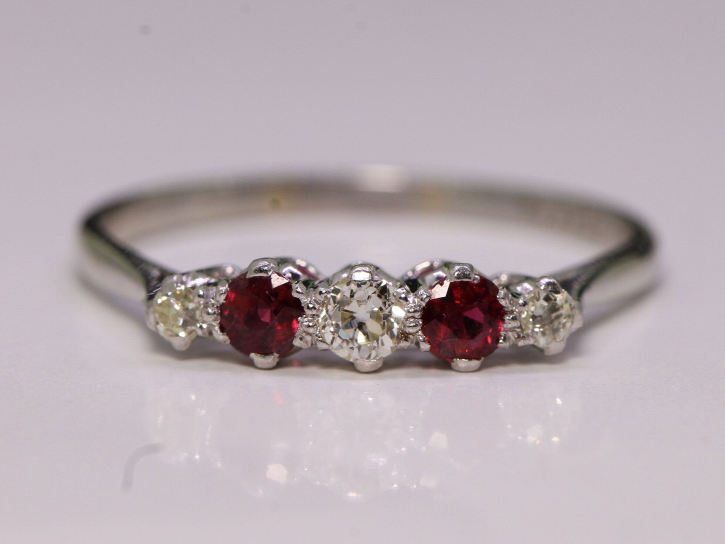  art deco ruby and diamond platinum five-stone ring