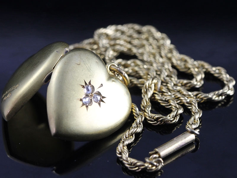 Beautiful edwardian diamond 15 carat locket and chain