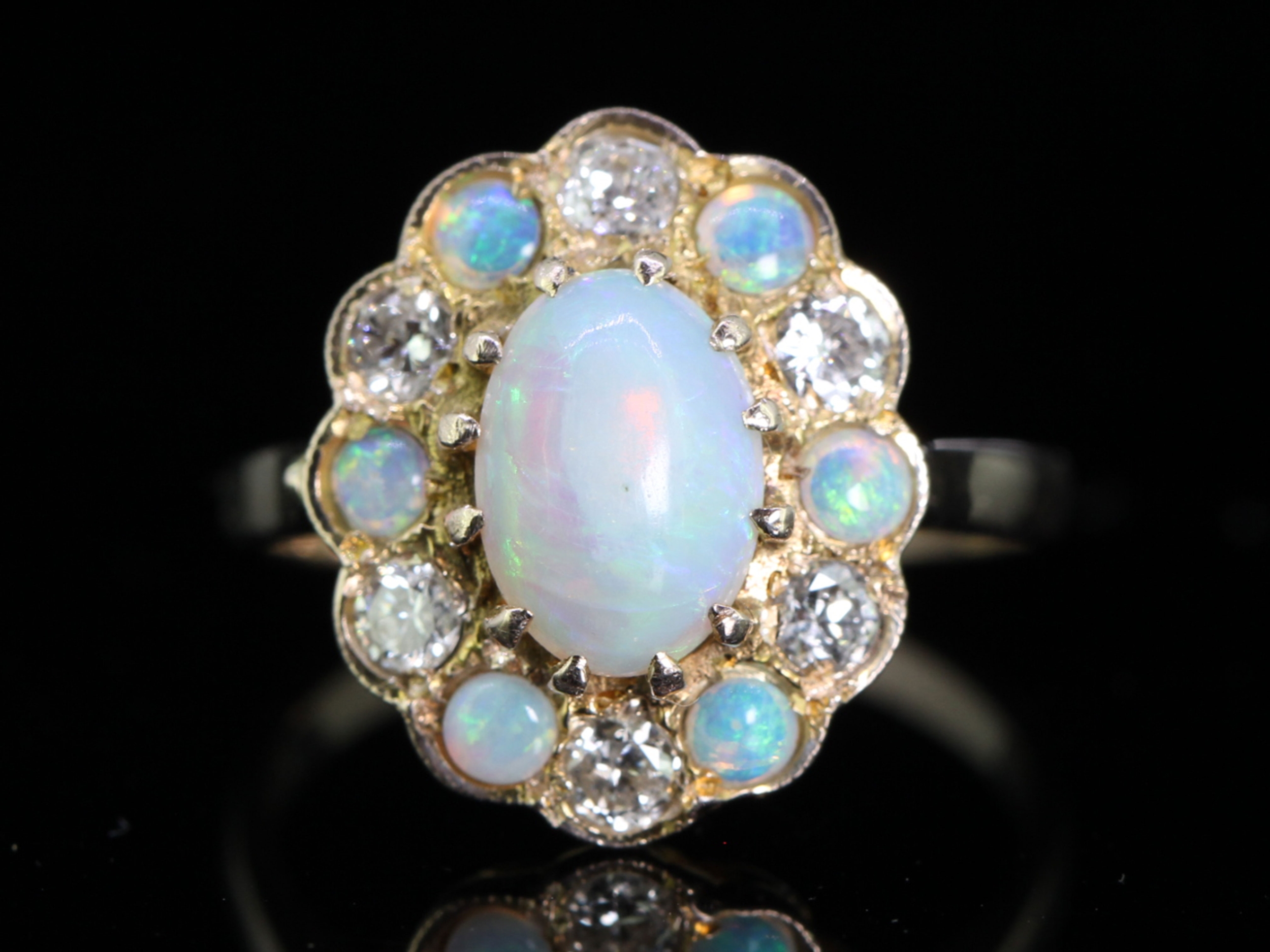 Tantalizing opal and diamond 9 carat gold cluster ring