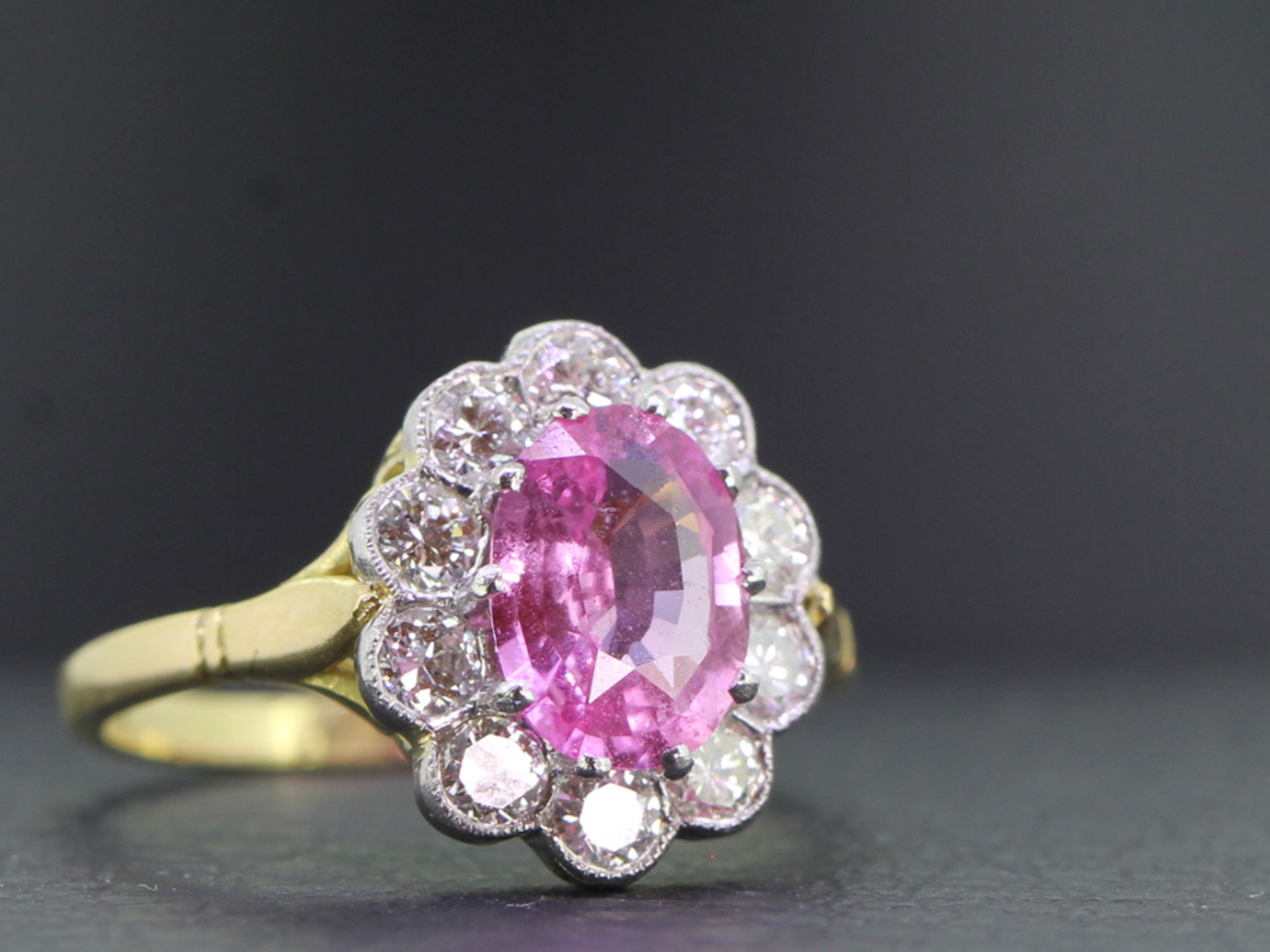 Stunning pink sapphire and diamond 18 carat gold and platinum cluster ring
