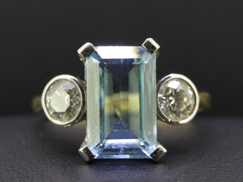 Enchanting aquamarine and diamond 18 carat trilogy ring