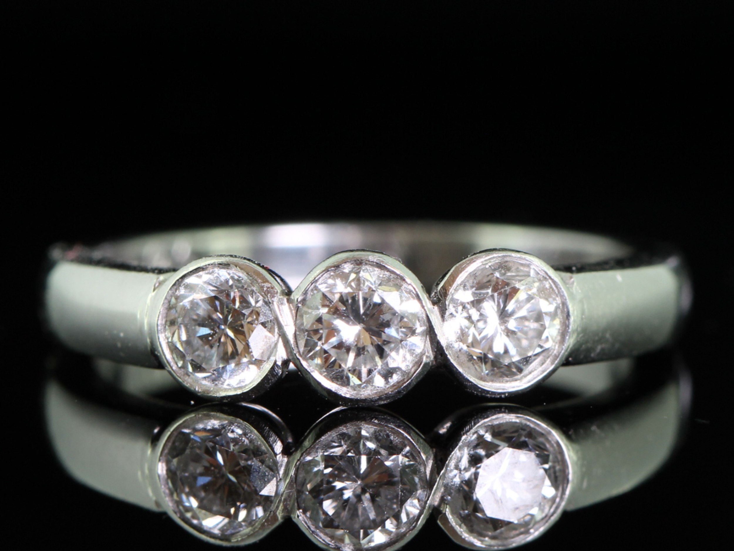 Elegant diamond trilogy platinum ring