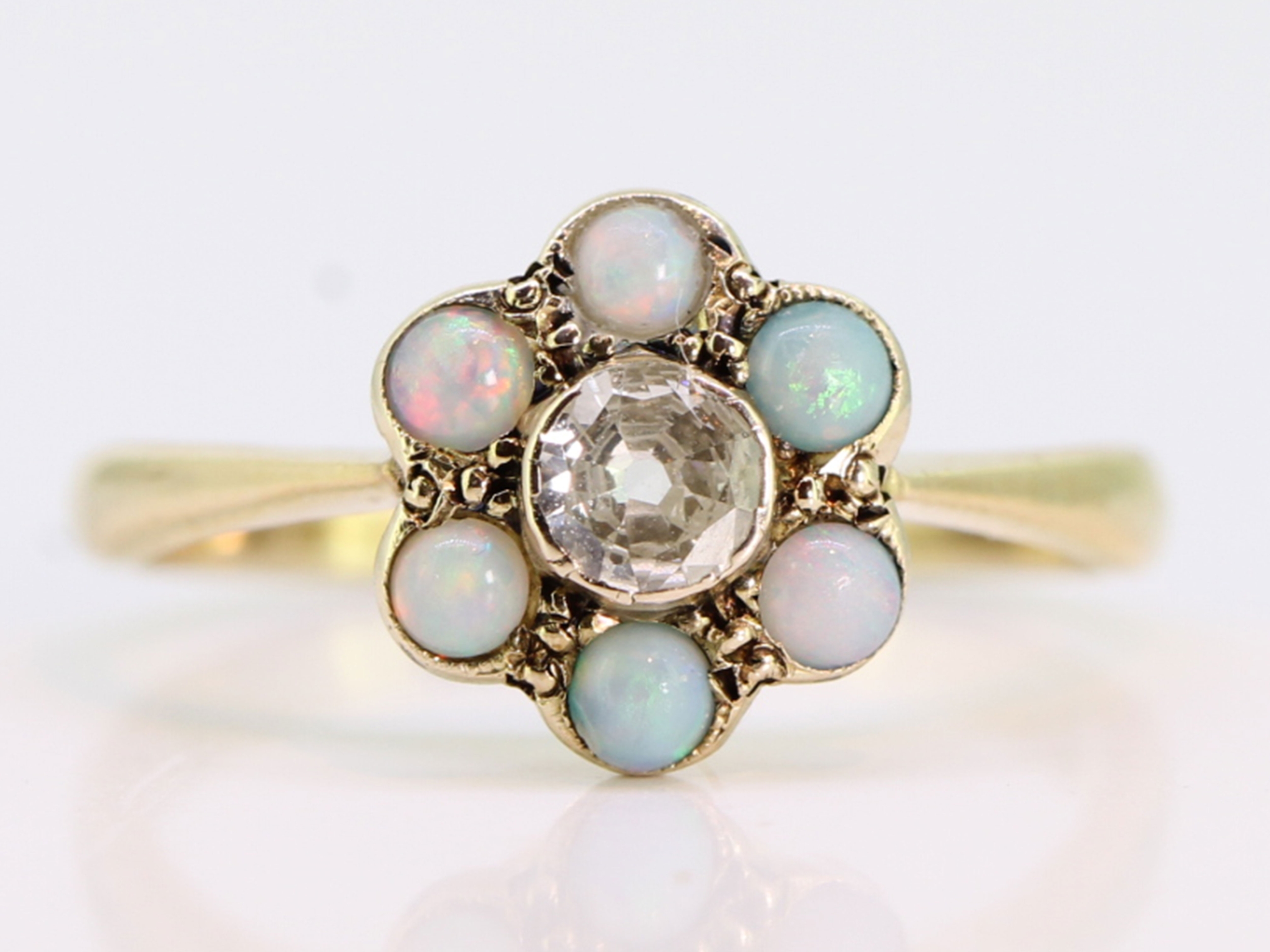  pretty vintage diamond and opal 18 carat gold daisy ring