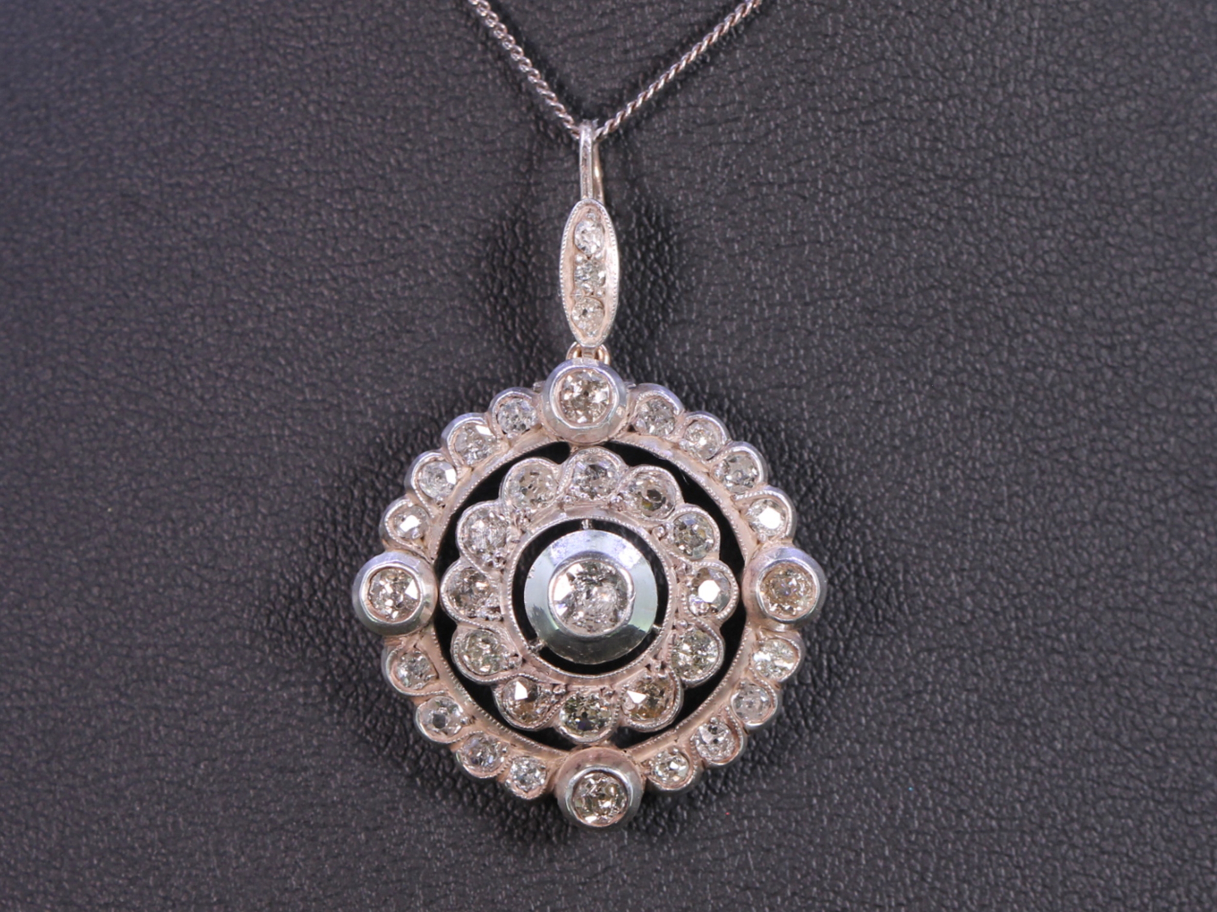 Victorian diamond set circular silver/gold pendant