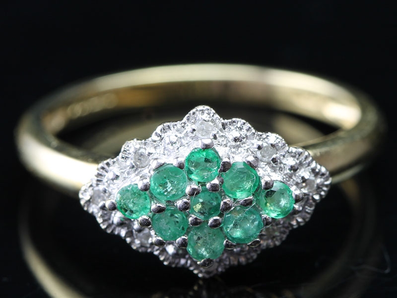 Beautiful emerald and diamond 9 carat gold cluster ring