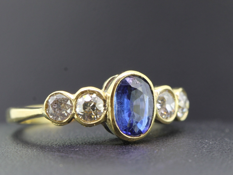 Stunning sapphire and diamond 18 carat gold five stone art deco inspired ring