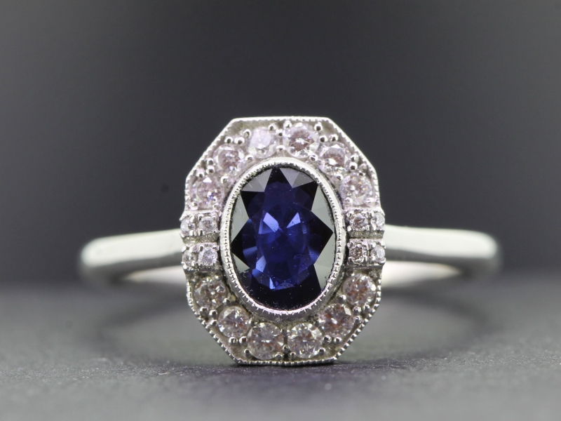 Wonderful sapphire and diamond cluster platinum ring