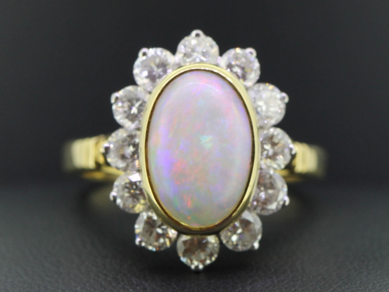  gorgeous opal and diamond cluster 18 carat gold ring