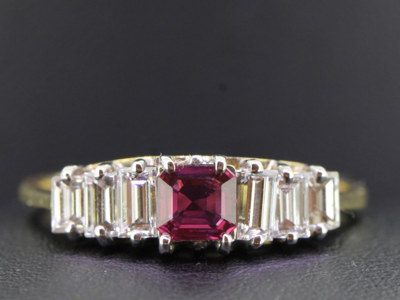Stunning seven stone ruby and diamond 18 carat gold ring
