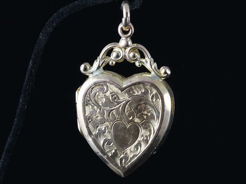 Charming engraved heart shaped 9 carat gold locket