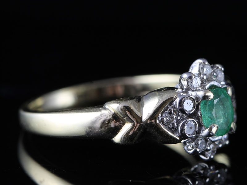 Devine emerald and diamond cluster 9 carat gold ring