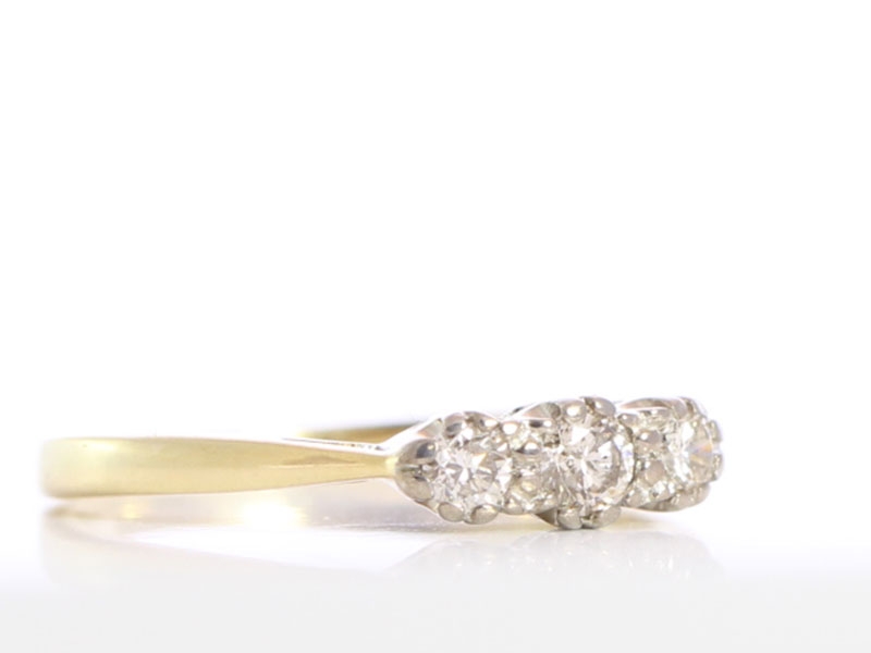  pretty three stone diamond 18 carat gold trilogy ring