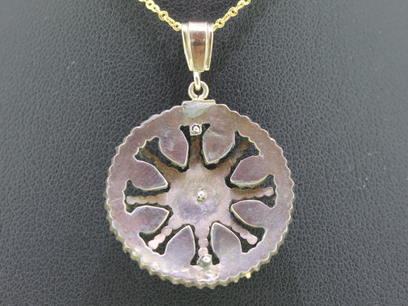 Sophisticated bohemian garnet gold pendant