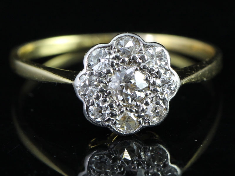 Simply lovely original 1920's diamond daisy cluster 18 carat gold ring