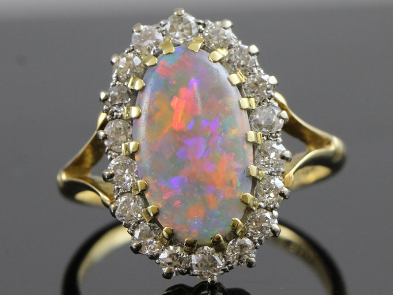An original edwardian opal and diamond 18ct gold ring