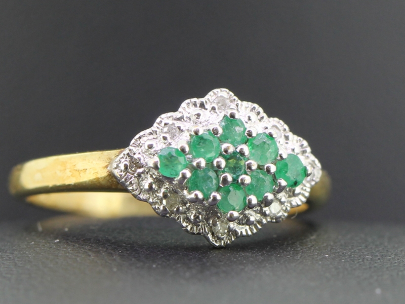 Beautiful emerald and diamond 9 carat gold ring
