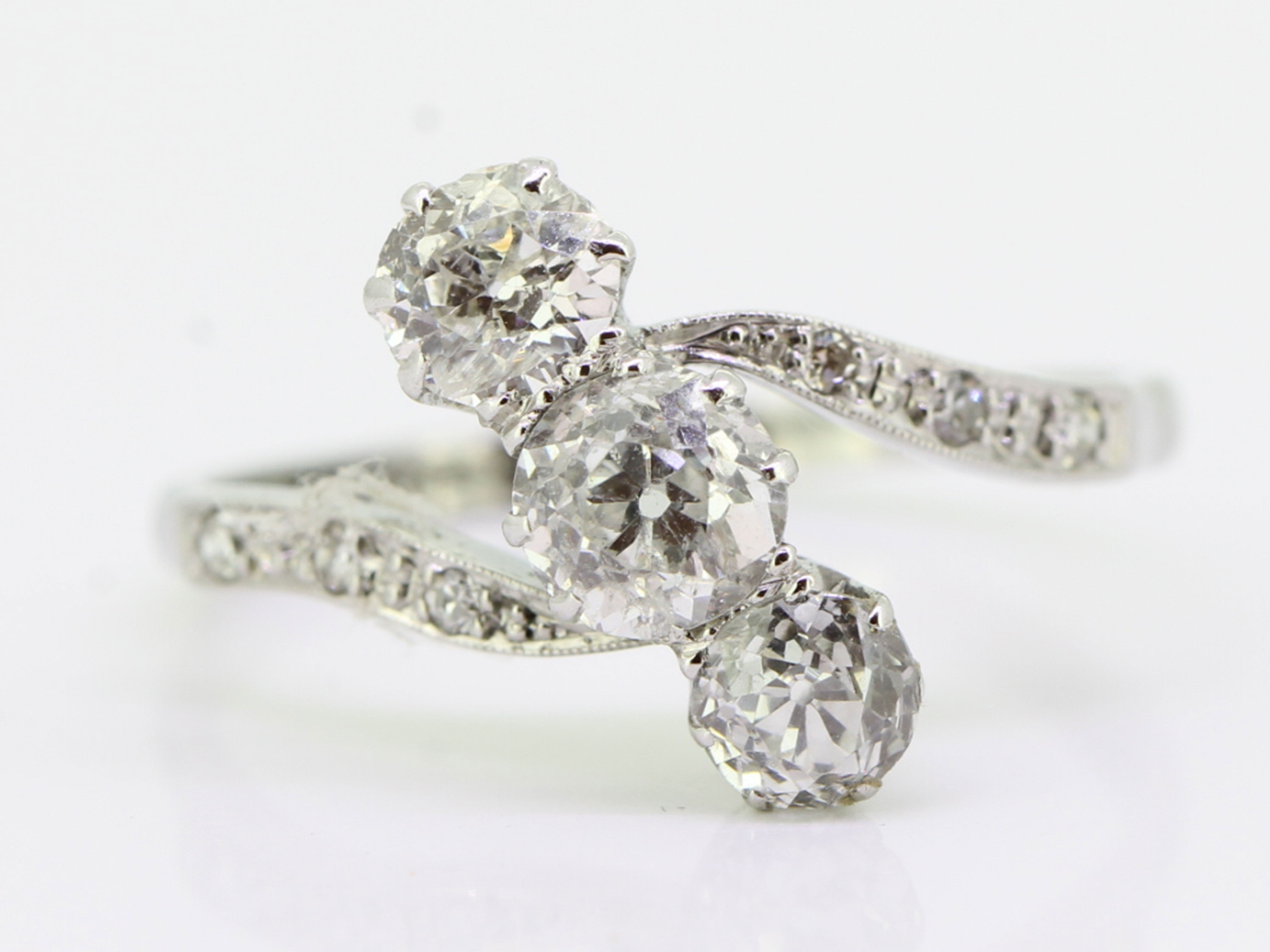 Stunning 1930's diamond platinum and 18 carat gold trilogy ring