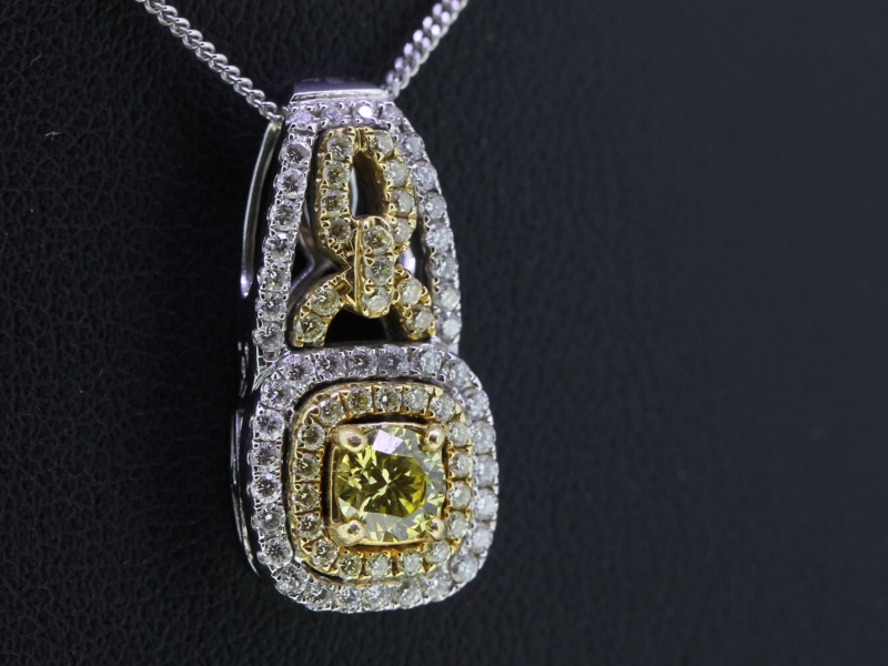 Stunning yellow and white diamond 18 carat gold halo pendant