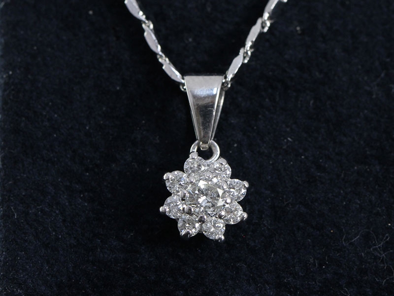 Romantic 18 carat gold diamond daisy pendant and 14 carat gold 18 inch chain 
