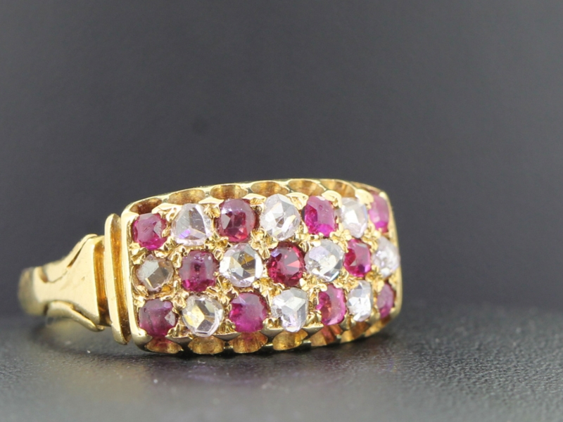 Beautiful ruby and diamond 18 carat gold band ring