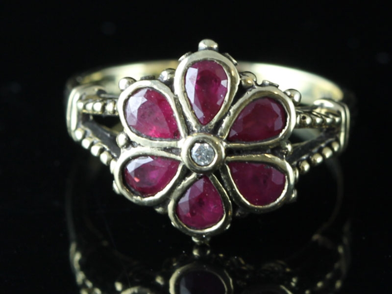 Beautiful ruby and diamond flower 9 carat gold cluster ring