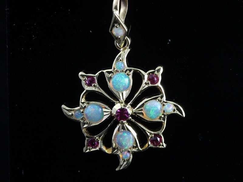 Beautiful edwardian opal and ruby carousel pendant and chain