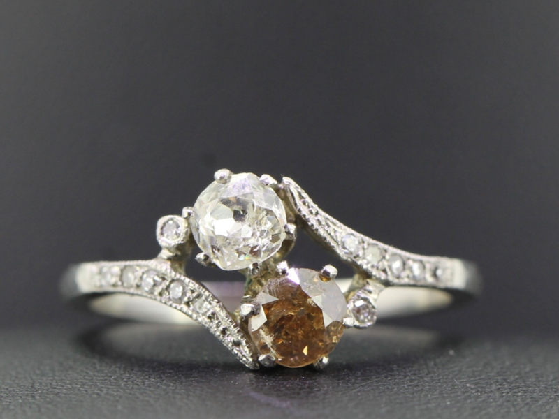  elegant two stone diamond platinum ring on a twist