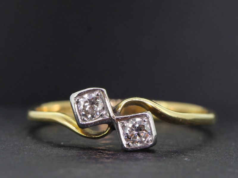 Pretty edwardian diamond on a twist platinum and 18 carat gold ring