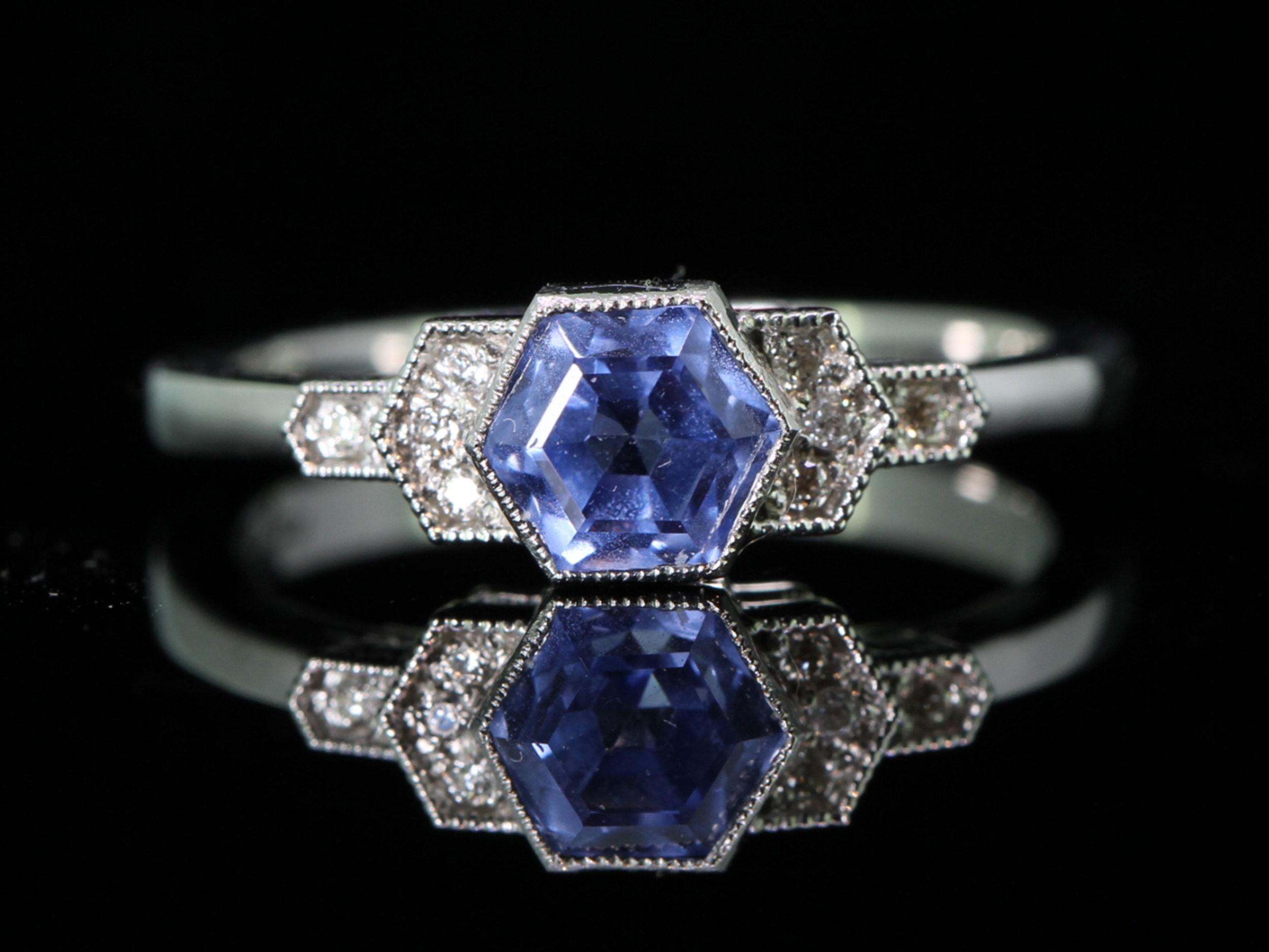 Unique sapphire and dimond platinum ring
