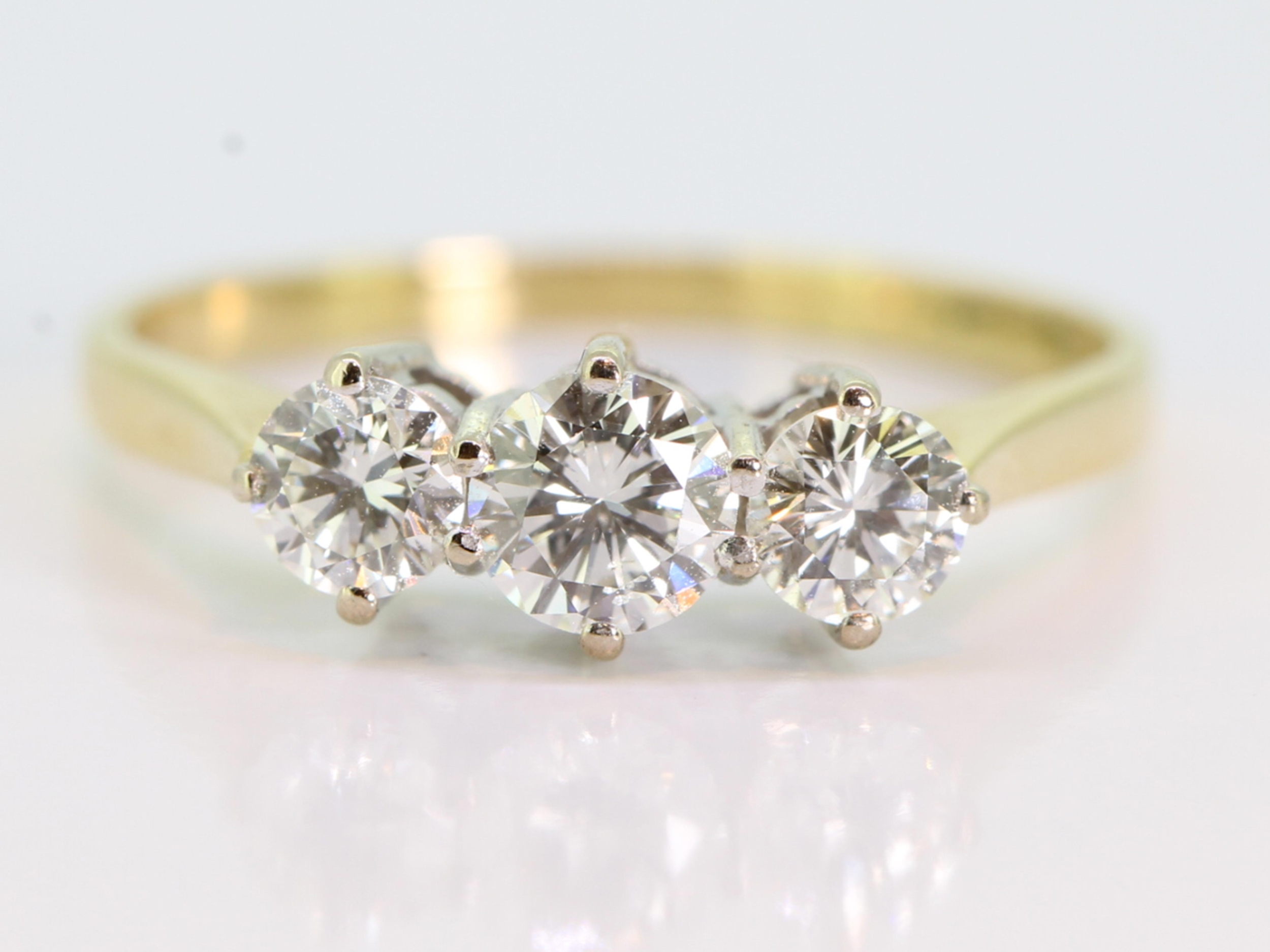 Classic diamond 18 carat gold trilogy ring