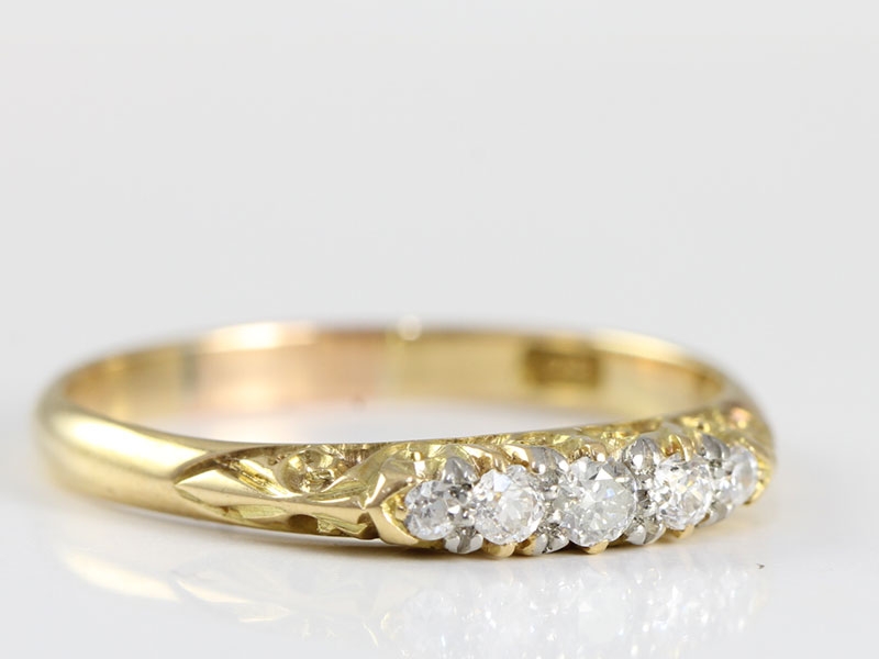 Pretty edwardian five stone diamond 18 carat gold ring