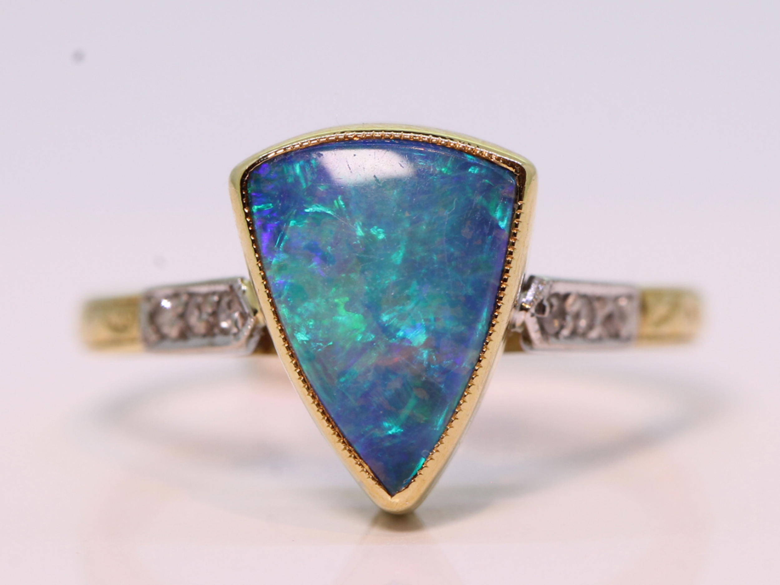 Vintage trillion cut black opal and diamond 18ct gold ring 