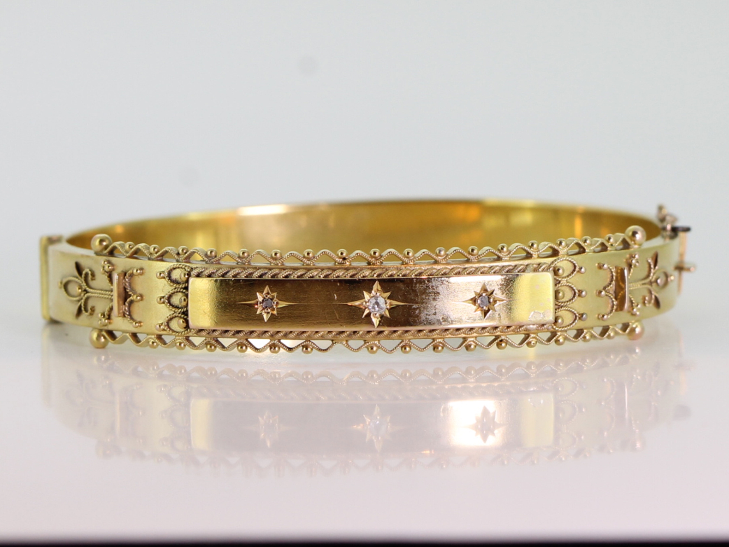 Wonderful edwardian 9 carat gold diamond etruscan style bangle