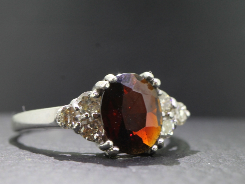 Eyecatching bohemian garnet and diamond 9 carat gold ring